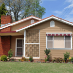 Corrugated Fibro Home with brick chimney - asbestos may be found under eaves, in extensions, bathrooms, laundries, kitchens and under flooring (carpet underlay, vinyl tiles or sheeting, wall and floor tiles) and electrical power boxes etc. Corrugated Fibro Home with brick chimney - asbestos may be found under eaves, in extensions, bathrooms, laundries, kitchens and under flooring (carpet underlay, vinyl tiles or sheeting, wall and floor tiles) and electrical power boxes etc.