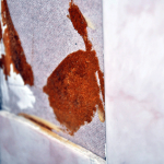 Close up of wall tiles on asbestos wall. AAG-Prod-Loc13