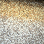 Asbestos can be found in the backing of vinyl sheet flooring to make it cushioned. Patterns included marble or stone chip. AAG-Prod-Loc27