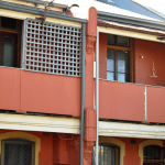 Broken fibro sheeting on balcony. Broken fibro sheeting on balcony.