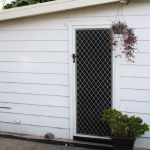 Asbestos weatherboard cladding on granny-flat AAG-Prod-Loc59