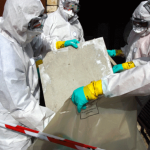 Preparing for legal disposal of asbestos sheeting. Photo courtesy of The Office of Environment and Heritage Remove materials containing some asbestos