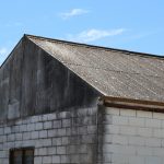Unpainted and weathered fibro gable