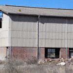 Corrugated asbestos cement roofing