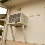 Airconditioner installed through ACM fibro sheet