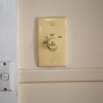 ACM wall with ceiling fan switch.