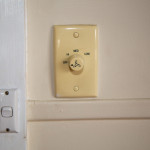 ACM wall with ceiling fan switch.