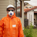 Removalist with signage at residential property